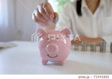 Female hand stack coins growing business. Saving money. Female hand stack coins growing business. Saving money. 75445892
