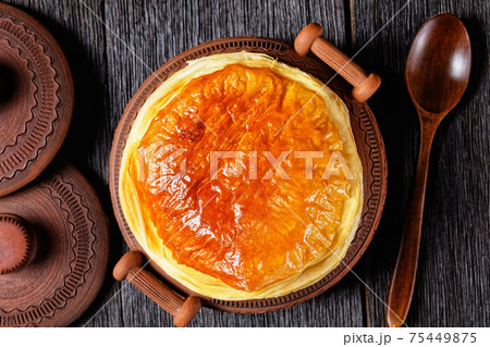 chicken pot pie in the rustic clay pots 75449875
