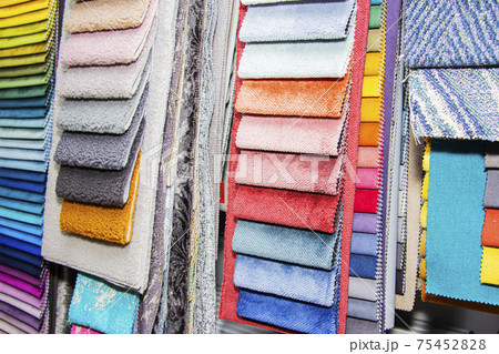 A set of fabric samples for furniture finishing. Multicolored upholstery stripes. 75452828