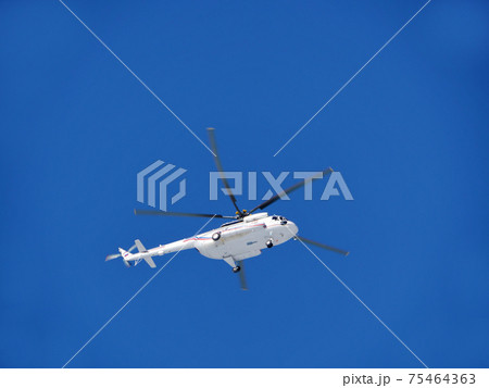 white helicopter Mi-8MTV flies white helicopter Mi-8MTV flies 75464363
