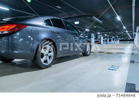 Parking lot. Car lot parking space in underground city garage. Empty road asphalt background. Ground floor for car parking. Parking lot. Car lot parking space in underground city garage. Empty road asphalt background. Ground floor for car parking. 75464646