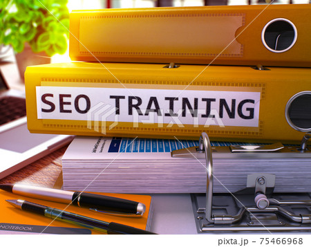 SEO Training on Yellow Office Folder. Toned Image. 75466968