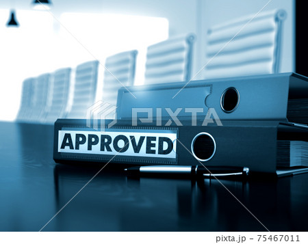 Approved on Office Binder. Blurred Image. 75467011