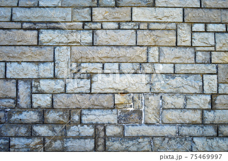 Sturdy blue and gray cut stone wall, seamless lined up 75469997
