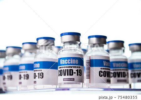 Glass vials for Covid-19 vaccine in laboratory. Group of Coronavirus vaccine bottles. Medicine in ampoules. Glass vials for Covid-19 vaccine in laboratory. Group of Coronavirus vaccine bottles. Medicine in ampoules. 75480355