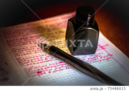 Text book with feather and inkpot poem on sheet Text book with feather and inkpot poem on sheet 75486015