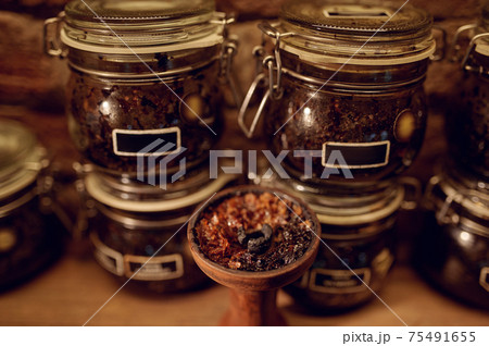 Hookah bowl with tobacco closeup, nobody Hookah bowl with tobacco closeup, nobody 75491655