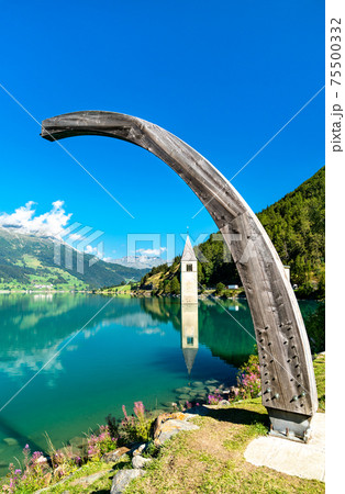 Submerged Bell Tower of Curon on Lake Reschen in South Tyrol, Italy Submerged Bell Tower of Curon on Lake Reschen in South Tyrol, Italy 75500332