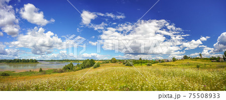 Clouds above the lake at sunny day Clouds above the lake at sunny day 75508933