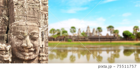 Giant stone face in Prasat Bayon Temple, Angkor Wat, Cambodia Giant stone face in Prasat Bayon Temple, Angkor Wat, Cambodia 75511757