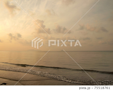 Wave of the sea on the sand beach Wave of the sea on the sand beach 75518761