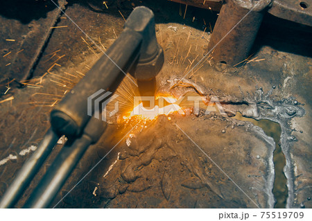 Zoom View Sparkle from Oxygen Acetylene Cutting Torch for Car Body Part Removal in Vintage Tone 75519709