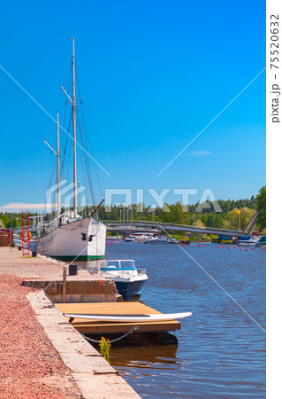White sailing ship is moored in marina of Porvoo 75520632