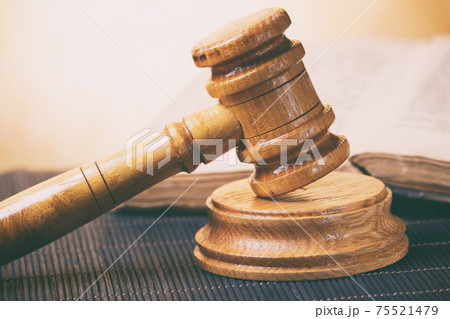 Judge's gavel and old book 75521479