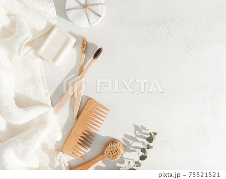 Various eco frendly items - toothbrushes, hairbrush, reusable cotton pads white towel and facial brush 75521521