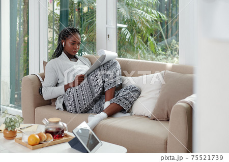 Woman working from home Woman working from home 75521739