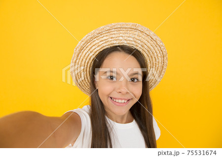 Turn back brim straw hat. Happy kid relaxing summer  75531674