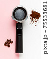 Espresso machine filter, ground coffee and coffee beans. 75533681