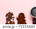 Detail of espresso machine filter, ground coffee and coffee beans. 75533684