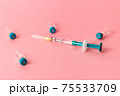 Syringe with several medical vials for injection. 75533709