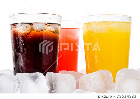 Colorful soft drinks for summer with ice cubes on white background 75534533