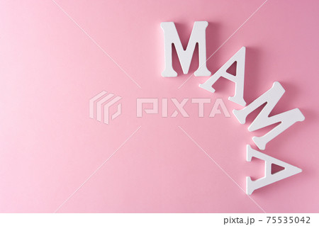 Mama word on pink background. Mother's Day Mama word on pink background. Mother's Day 75535042