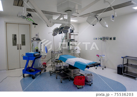 The operating room in the hospital with all the equipment in white and blue. 75536203
