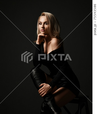 Sexy blonde woman in black clothes with naked Sexy blonde woman in black clothes with naked 75543586