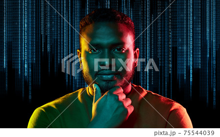 young african american man over binary code young african american man over binary code 75544039