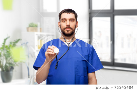 doctor or male nurse with stethoscope 75545484