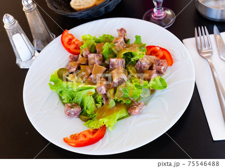 French salad with headcheese, pickles, greens, tomatoes 75546488