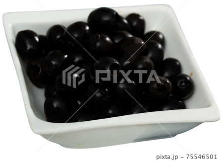 Plate with delicious pitted black olives Plate with delicious pitted black olives 75546501