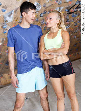 Satisfied fit couple after climbing workout Satisfied fit couple after climbing workout 75546863
