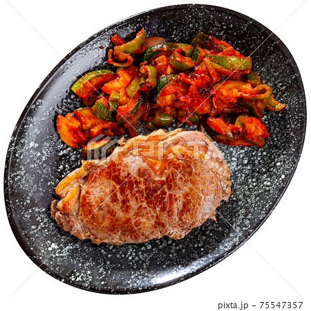 Beef with stewed vegetables and spices Beef with stewed vegetables and spices 75547357