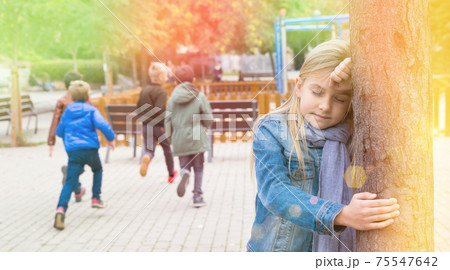 Kids playing hide and seek on the street 75547642