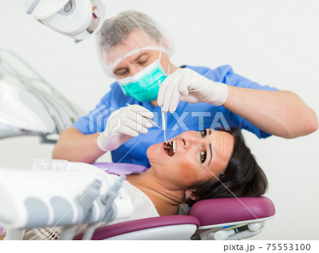 dentist professional filling teeth dentist professional filling teeth 75553100