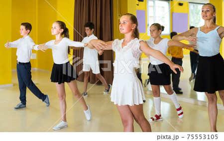 Group of children are dancing rock-n-roll 75553105