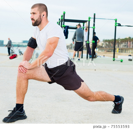 Warming up young man Warming up young man 75553593