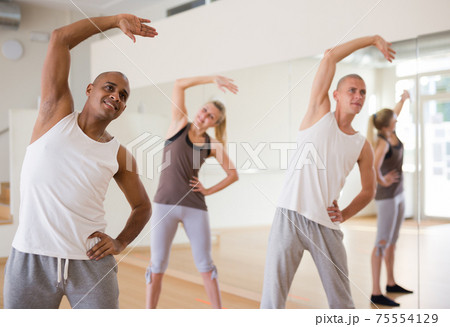 Group of activity people practicing dance techniques 75554129