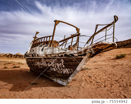 Strange Boat Stuck on Sand Hundres of KM From Nearest Water in Wadi Rum Jordan Strange Boat Stuck on Sand Hundres of KM From Nearest Water in Wadi Rum Jordan 75554942