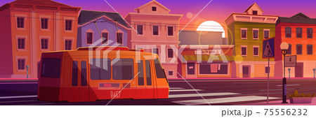 Tram riding on retro city street at sunset time Tram riding on retro city street at sunset time 75556232
