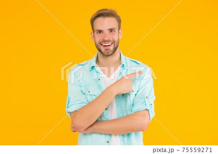 positive happy guy pointing finger and wear denim style positive happy guy pointing finger and wear denim style 75559271