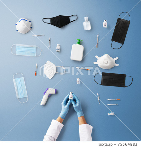 Hand with syringe injection, covid-19 and vaccination concept. Hand with syringe injection, covid-19 and vaccination concept. 75564883