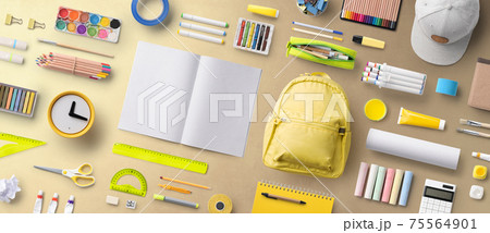 Flat lay top view of face mask and school supplies, back to school and coronavirus concept. 75564901