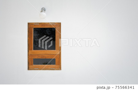 wooden window and lamp on white wall background 75566341