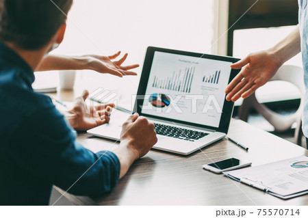 close up. group of employees discussing financial data. 75570714