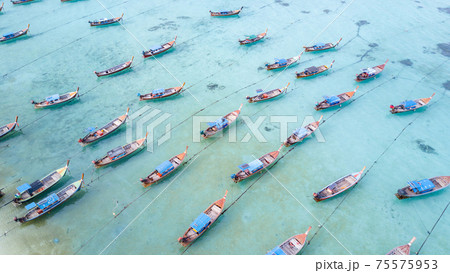 Aerial view of long tail boats in Andaman sea at Lipe Island 75575953