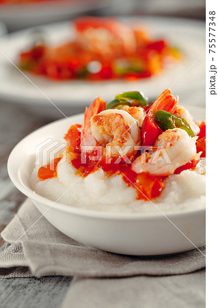 Shrimp and Grits on a plate. . High quality photo Shrimp and Grits on a plate. . High quality photo 75577348