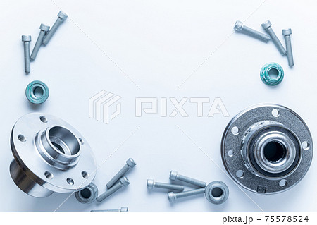 Spark plugs. Auto motor mechanic spare or automotive piece on white background. Set of new metal car part. Flat lay, top view, copy space. 75578524