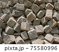 Pile of gray street paving mostly cubic shape before stealing the road surface 75580996